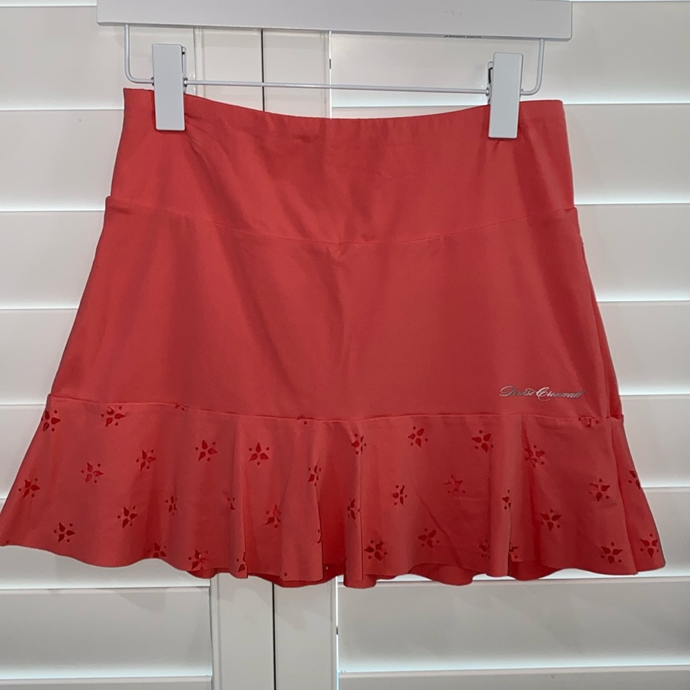 Denise Cronwall luxury tennis skirt . Pinky coral lazer cut flounce size small